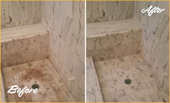 Before and After Picture of a Harrington Marble Shower Honed to Remove Dark Stains