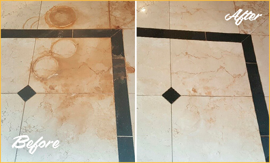 Before and After Picture of a Rehoboth Beach Hard Surface Restoration Service on a Marble Floor to Eliminate Rust Stains